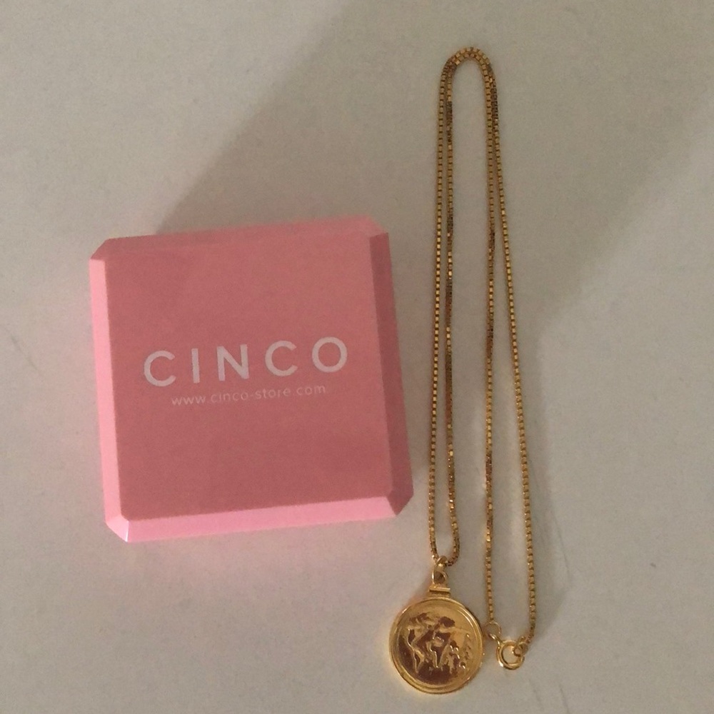 Women’s gold coin necklace